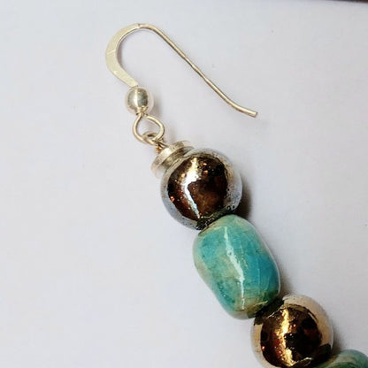 ETHNOS MODEL DANGLING EARRINGS