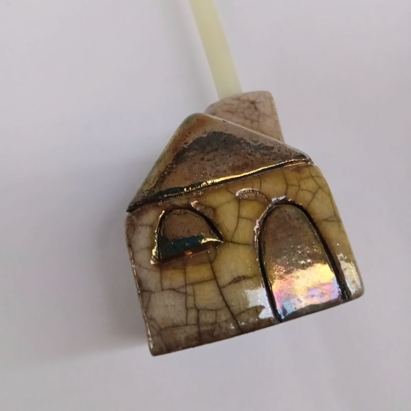 HOUSE-SHAPED CANDLE HOLDER