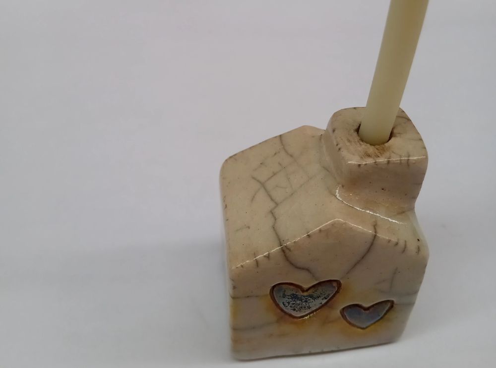 HOUSE-SHAPED CANDLE HOLDER